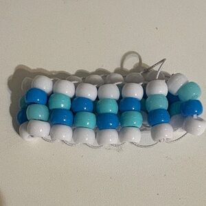 Homemade Kandi cuff bracelet | Blue cross cross pattern
